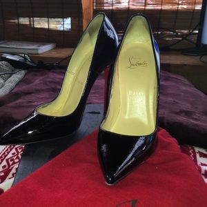 Christian Louboutin; authentic red bottoms